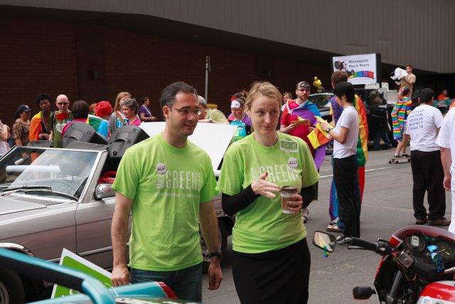 Brian Shekleton and Rep. Marion Greene talk to supporters before the start of the parade.
